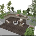 Outdoor Sofa Seating Area With Wooden Deck Lush Green Plants Fire Pit And Accent Chairs