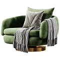 Patterned Accent Lounge Chair With Striped Pillow Throw Blanket And Gold Swivel Base