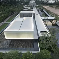 Contemporary Modern Building With Skylight Roof Glass Facade And Greenery