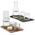 Textured Clear Glass Cups On Wooden Tray With Glass Carafe And Mint Leaf