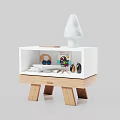 Modern White Bedside Table With Wooden Legs Featuring Decorative Tree Books Glasses And Colorful Pencils