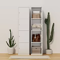 White Entryway Side Cabinet with Storage Baskets Folded Towels and Cactus Plants on Wooden Floor