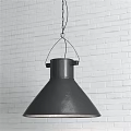 Dark Conical Metal Pendant Light Hanging On Chain Against White Brick Wall