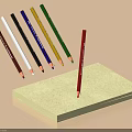 Colored Pencils With Red One Arranged Around Yellow Notepad On Light Brown Background