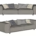 Modern Beige Two Seater Sofa With Striped Grey Pillows And Soft Fabric Design