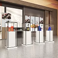 Museum Exhibition Hall With Glass Display Cases Golden Frames And White Pedestals
