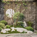 Garden Ornament Design With Stones Green Plants Round Decoration And Mossy Ground