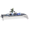 Elegant Dinnerware Set on White Lace Tablecloth with Blue Ceramic Plates and Candle Holders