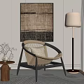 Wicker Armchair With Floor Lamp And Woven Wall Art In Cozy Living Space