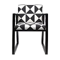Modern Accent Chair with Black and White Geometric Pattern Upholstery and Sleek Black Frame Design