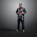 Smiling Man Standing and Holding Baby in Baby Carrier Against Gray Background