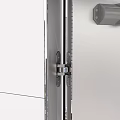 Stainless Steel Swing Door With Hinges Open On White Tiled Wall Interior