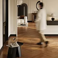 Stylish Foyer Hallway With Herringbone Wood Flooring Side Table Decorative Sculpture And Table Lamp