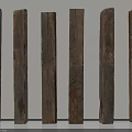 Natural Wooden Posts With Various Textures Arranged Against Wall 3d model