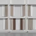 Modern Curtains in White Beige and Light Brown Displayed on Shelves for Interior Design