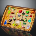 Colorful Small Handmade Figurines in Rustic Tray with Assorted Shapes and Designs
