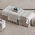 Minimalist Modern Massage Bed with Soft Linen Sheets Rolled Towels Side Trolley and Stool
