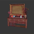 Vintage Wooden Dresser With Golden Framed Mirror And Decorative Items On Top