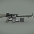 Military Rifle With Green Stock Black Components Magazines And Bullets On Gray Surface