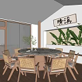 Chinese Style Private Dining Room With Round Marble Table Rattan Chairs And Green Plants