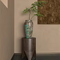Decorative Potted Fern Plant In Teal Ceramic Vase On Wooden Pedestal Against Beige Wall