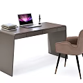 Modern Home Office Desk Setup With Laptop Table Lamp Chair And Stacked Books