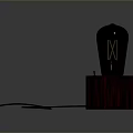Black Computer Peripheral Device With Red Wooden Base Gold XII Symbol And Black Cable