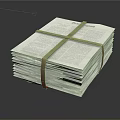 Organized Stack of Books and Magazines Tied with String on Dark Background