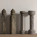 Set of Four Decorative Stone Columns with Intricate Carved Motifs
