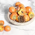 Fresh Persimmons in Stone Bowl with Pine Cone on Marble Surface