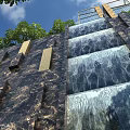 Garden Water Wall Feature With Flowing Water Stone Surface And Decorative Blocks