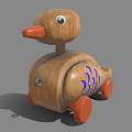 Wooden Toy Duck With Orange Beak Wheels And Blue Fish Scale Design