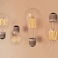 Various Shaped Illuminated Light Bulbs With Unique Design Display On Wall 3d model