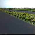 Scenic Riverfront Green Area With Trees Boats And Distant Cityscape