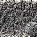 Detailed Gray Rock Texture Component Featuring Cracked Surface And Circular Protrusion