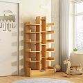 White Multi Tiered Bookcase In Kids Room With Wall Decor And Natural Light