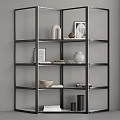 Modern Black Metal Shelving Unit With Decorative Vases Books And Photo Frames