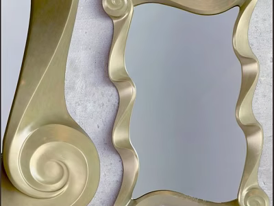 Ornate Golden Mirror With Curved Scroll Frame And Elegant Design 3d model