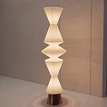 Modern Layered Floor Lamp With White Shade And Wooden Base In Minimalist Interior