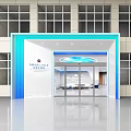 Modern Exhibition Hall Entrance With White Structure Glass Doors Blue Circular Decoration And Green Plant