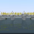 Scenic Bridge Over Water With Yellow Trees Street Lamps Green Grass And Vehicles