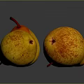 Fresh Ripe Juicy Yellow Red Speckled Pears on Dark Reflective Surface
