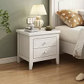 White Wooden Nightstand With Two Drawers Lamp Books And Teacup By Bedside Green Plant