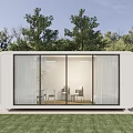Modern White Container House on Green Grassland with Trees and Glass Doors