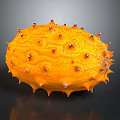 Fresh Shiny Orange Kiwano Horned Melon with Spiky Exterior on Dark Background