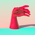 Artistic Red Glossy Hand Sculpture With Blue And Pink Background