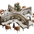 Casual Sofa Set with Curved Design Beige Upholstery Patterned Cushions and Small Round Tables