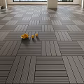 Gray Wooden Flooring in Interior Space with Yellow Fruits and Two Yellow Cups on It