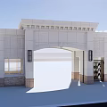 White Stone Entrance Gate With Classical Arched Design And Black Iron Door
