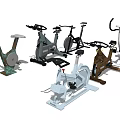 Different Types of Sports Equipment Including Stationary Bikes and Elliptical Trainers